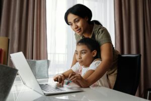 Photo by August de Richelieu: https://www.pexels.com/photo/mother-helping-her-daughter-use-a-laptop-4260325/